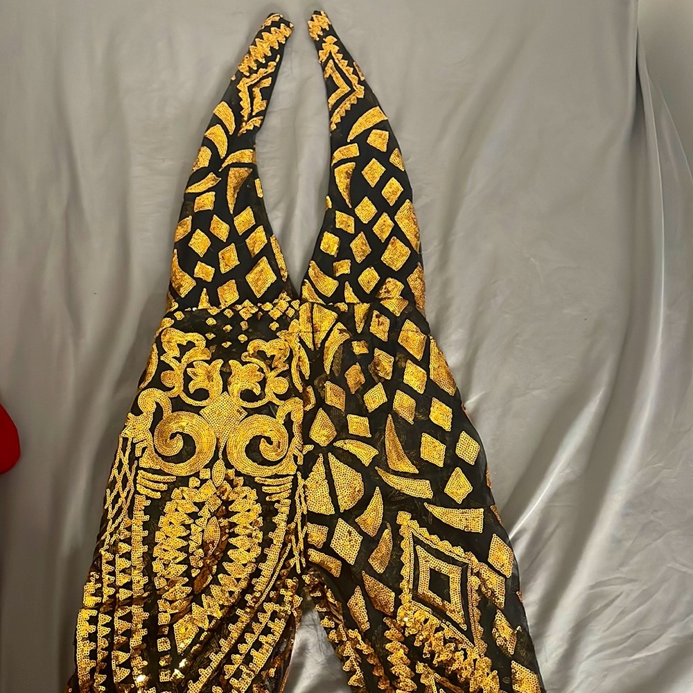 Black & Gold Sequence One Piece Jumper.